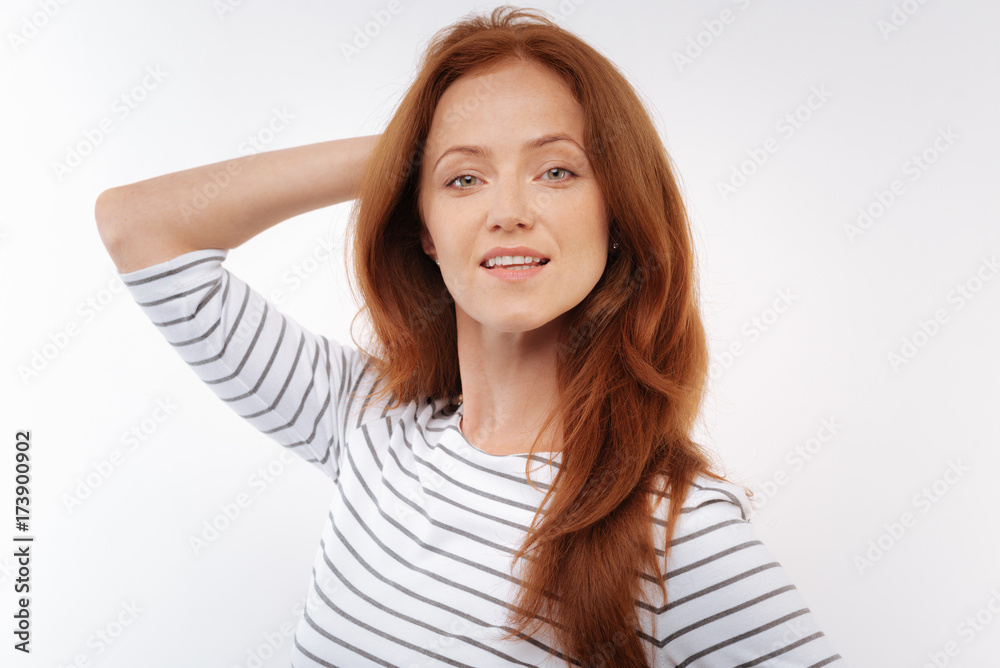 Ginger-haired woman posing on white background Ginger-haired woman posing on white background