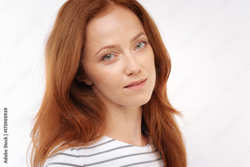 Portrait of ginger-haired woman with loose hair Portrait of ginger-haired woman with loose hair