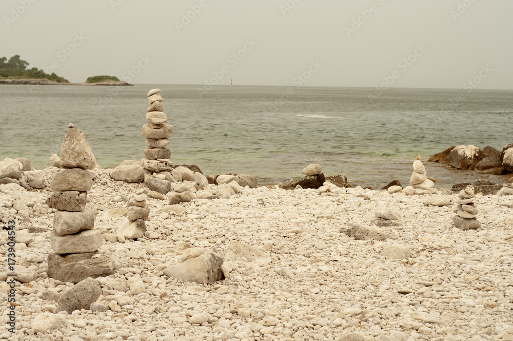 Zen stones on a beach of Rovinj, Croatia. Zen stones on a beach of Rovinj, Croatia.