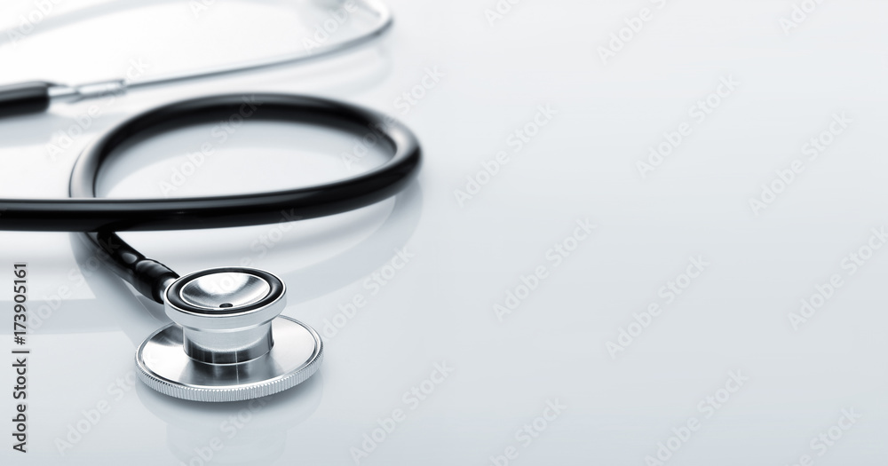 Stethoscope with reflection on glossy background. Stethoscope with reflection on glossy background.