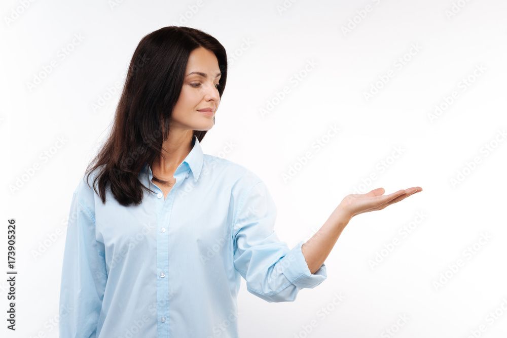 Charming dark-haired woman stretching her hand Charming dark-haired woman stretching her hand
