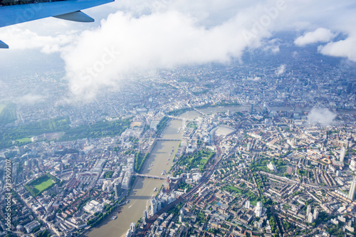 Aerial view of London city, urban area on either side of River Thames.