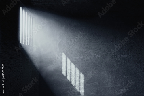 3d rendering of grunge prison cell with the shadows of stanchions projected on wall from light ray on window