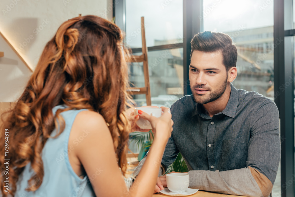 Fototapeta premium couple drinking coffee in cafe