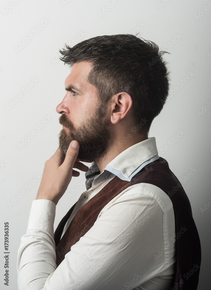 Man with long beard and mustache on thoughtful face. Man with long beard and mustache on thoughtful face.