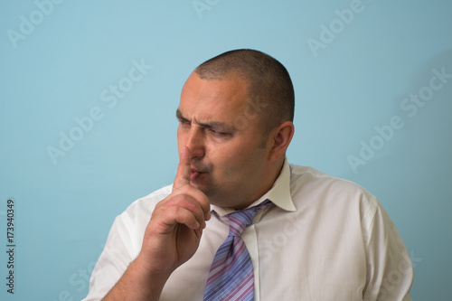 Photos man put finger on her lips