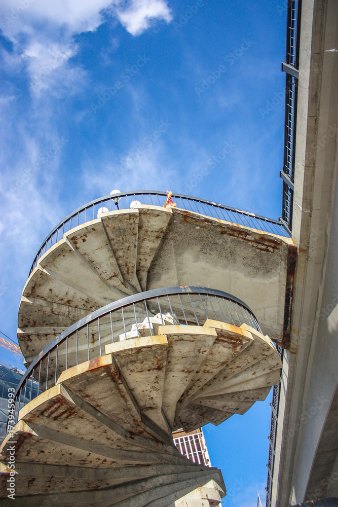 spiral staircase on blue sky