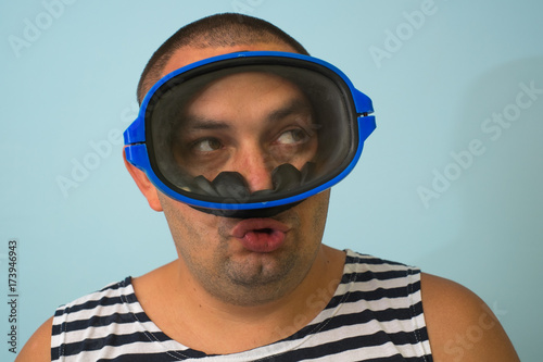 Man in a mask for swimming