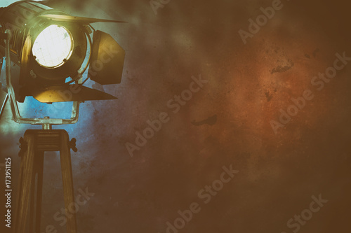 Illuminated, smoky stage light with copy space photo