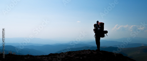 Father with baby son in mountainous  areas. Travel adventure and hiking activity with child, active and healthy lifestyle banner.