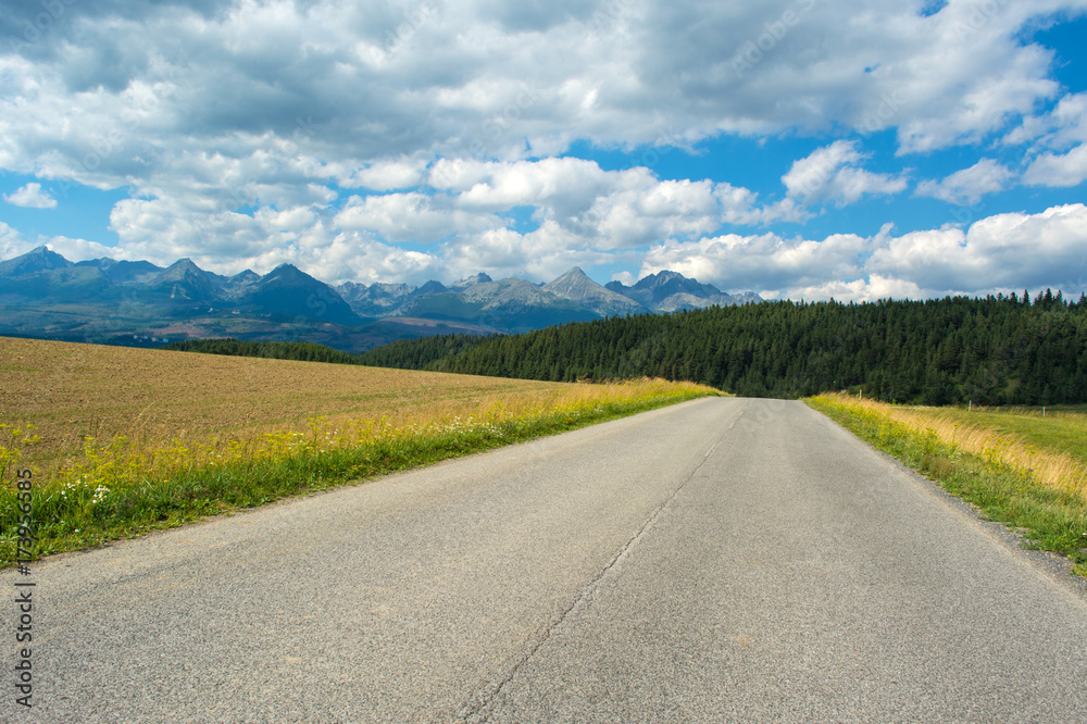Summer scenic view of mountains and road Summer scenic view of mountains and road