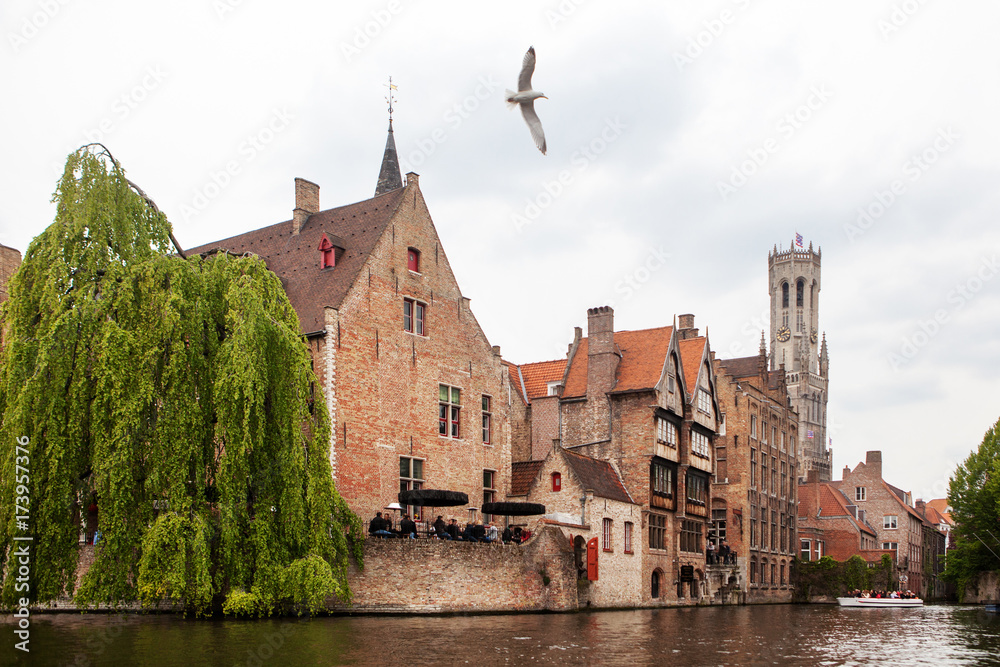Canal in Bruges with the famous Belfry tower