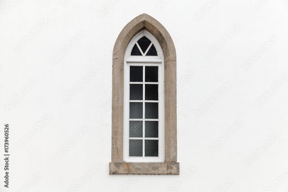 Window in white stone wall, Gothic Revival Window in white stone wall, Gothic Revival