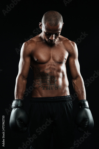 Portrait of young afroamerican boxer in gloves © Drobot Dean