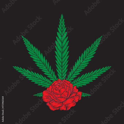 Embroidery with red roses and cannabis leaves.