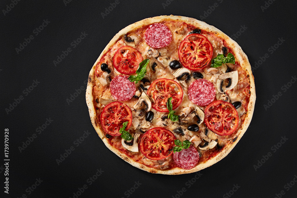 Food ingredients in pizza on black concrete background. Food ingredients in pizza on black concrete background.