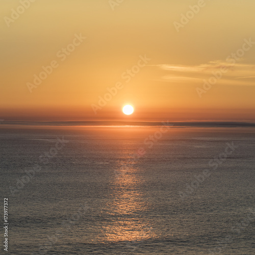 romantic sunset at the atlantic ocean seen from  Gay Head cliffs at the westernmost point of Martha's Vineyard in Aquinnah © travelview