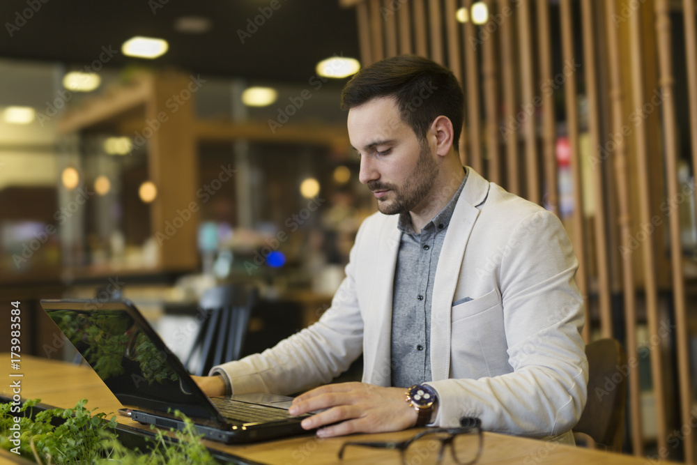 Fototapeta premium Businessman at the coffee shop