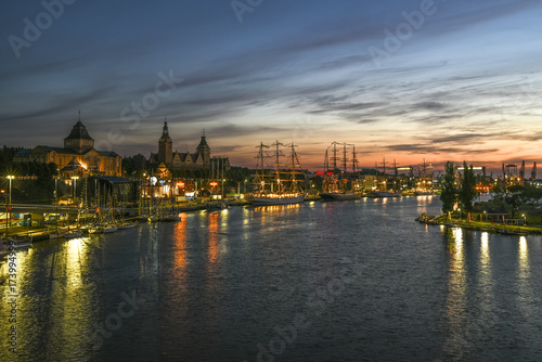 Final The Tall Ships Races in Szczecin 2017. Ships and cityscape by night.