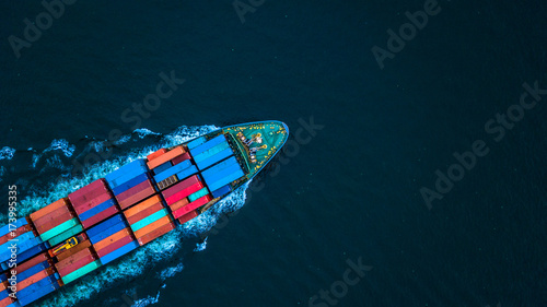Foto Aerial view from drone, Container ship or cargo shipping business logistic import and export freight transportation by container ship in open sea, Container loading cargo freight ship boat