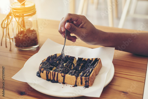 Breaded chocolate cake on table ready to eat.