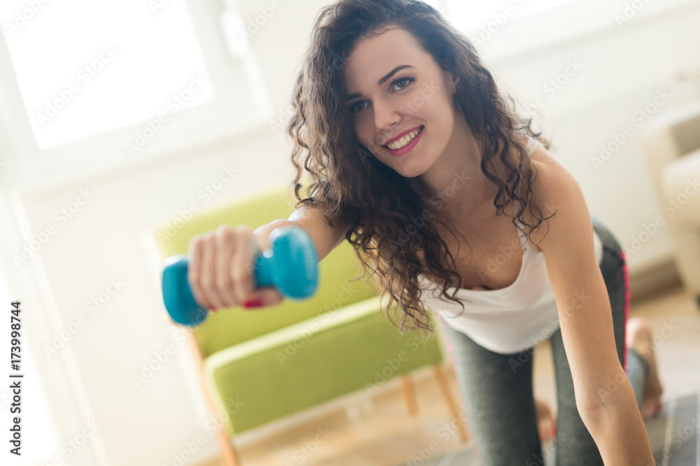 Happy determined woman working out Happy determined woman working out