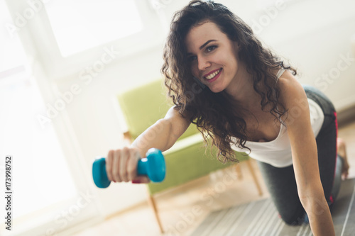 Happy determined woman working out