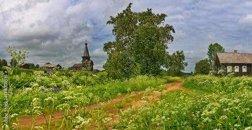 Old wooden Church on the banks of the river in the village Samino. photo