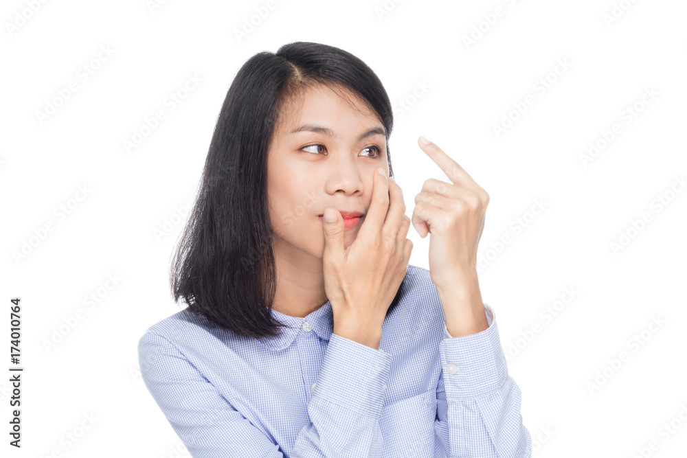 Portrait of a beautiful asian business woman applying contact lens to her eyes. Isolated on white background Portrait of a beautiful asian business woman applying contact lens to her eyes. Isolated on white background