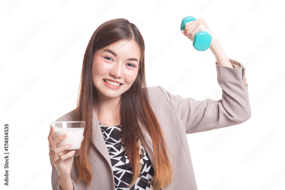 Healthy Asian woman drinking a glass of milk and dumbbell. Healthy Asian woman drinking a glass of milk and dumbbell.