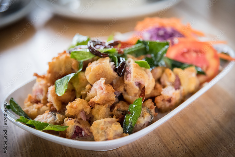Fried fish and crisp bergamot and fried chili. Main course Thai recipe Fried fish and crisp bergamot and fried chili. Main course Thai recipe