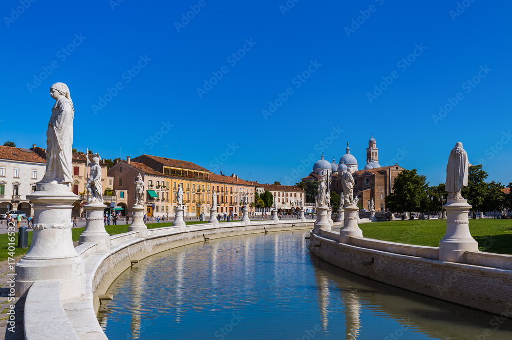 Canal with statues on prato della Valle in Padova Italy