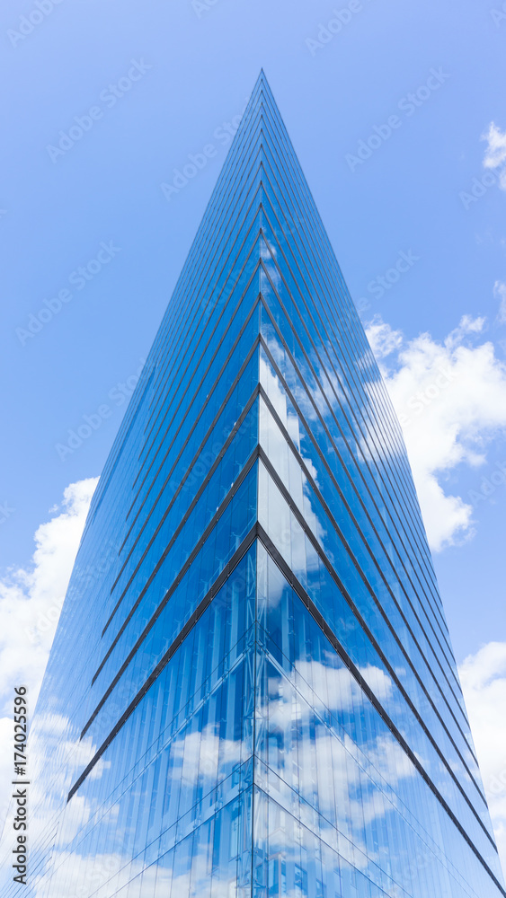 view of skyscraper in clouds in dusseldorf. germany view of skyscraper in clouds in dusseldorf. germany