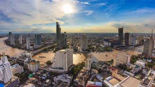 Aerial Bangkok Citysacpe And Chao Phraya River Of Bangkok, Thailand 4K Time Lapse (zoom out) photo