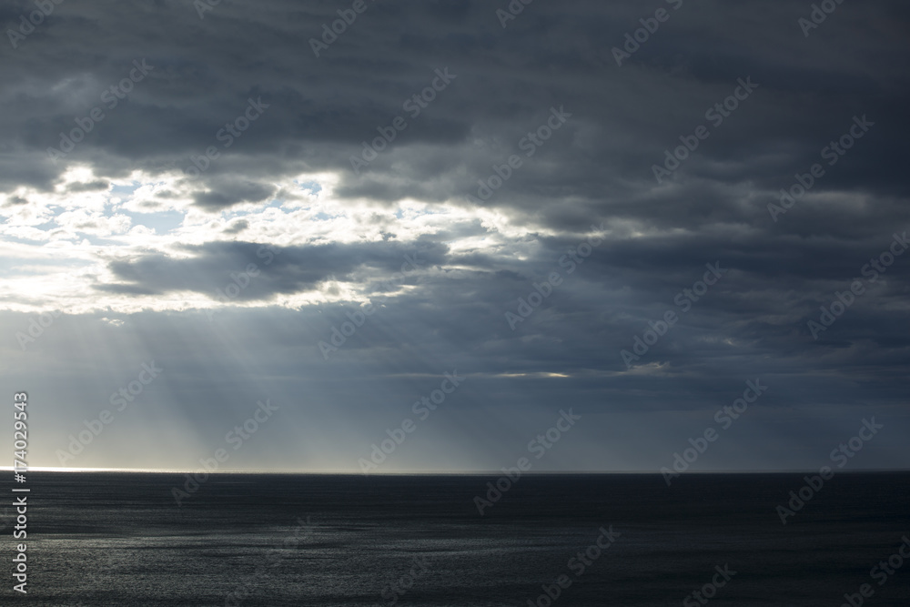 Epic Light Rays at Sunrise Over Ocean