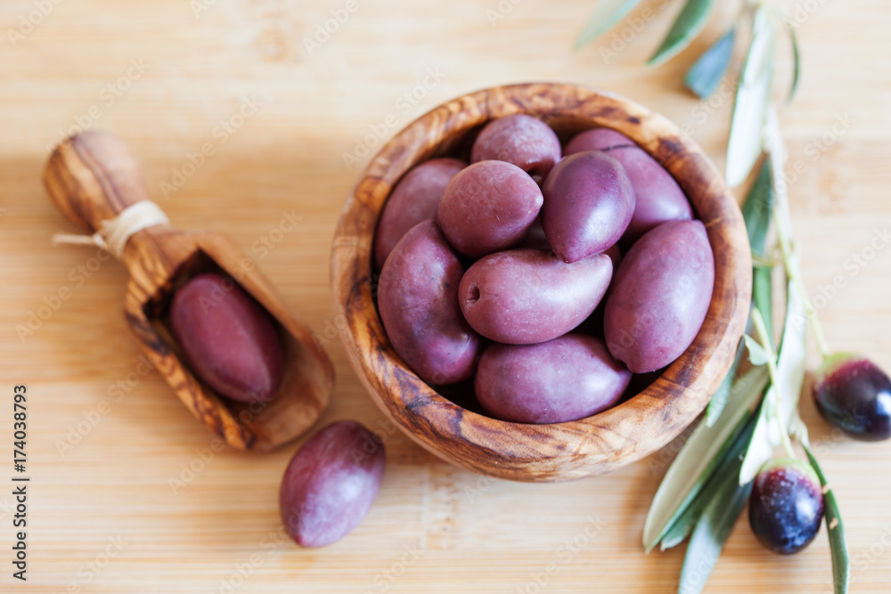 olives on wooden background, kalamata, kalamon, green olives olives on wooden background, kalamata, kalamon, green olives