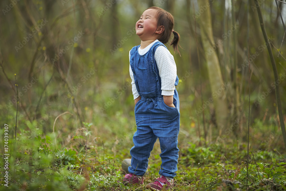 happy little asian girl outdoor happy little asian girl outdoor