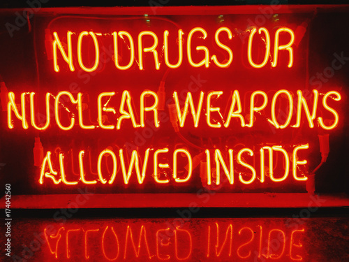 No Drugs or Nuclear Weapons Allowed Inside neon sign