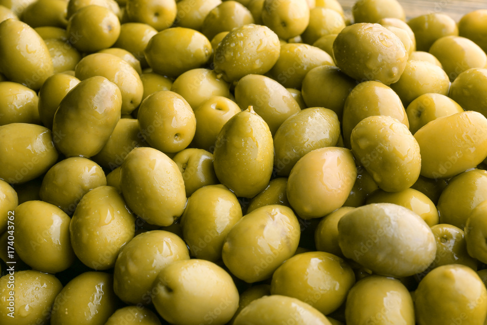 Many green olives as background Many green olives as background