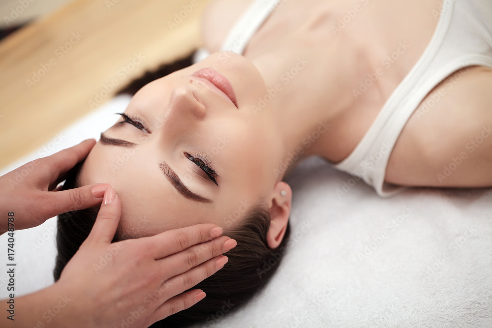 Body Care. Spa Woman. Beauty Treatment Concept. Beautiful Healthy Caucasian Girl Relaxing On Massage Table Before Hand Massage On Relaxed Back In Health And Spa Salon. Skin Care, Wellness, Lifestyle