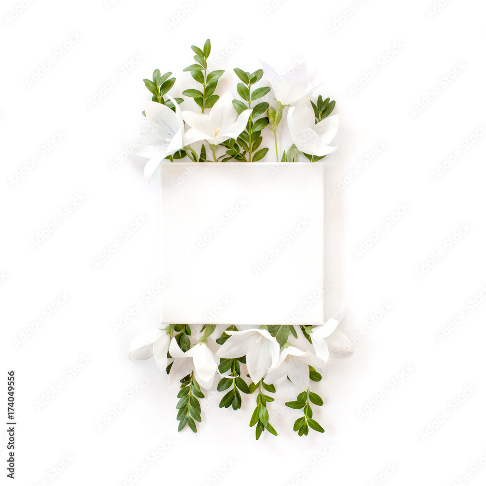 white fabric mock-up with blooming flowers and leaves.