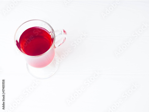 a glass of mulled wine, one for white background, space for text