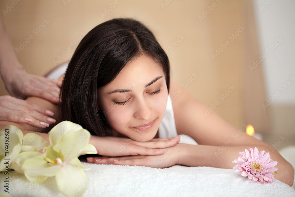 people, beauty, spa, healthy lifestyle and relaxation concept - close up of beautiful young woman lying with closed eyes in spa people, beauty, spa, healthy lifestyle and relaxation concept - close up of beautiful young woman lying with closed eyes in spa