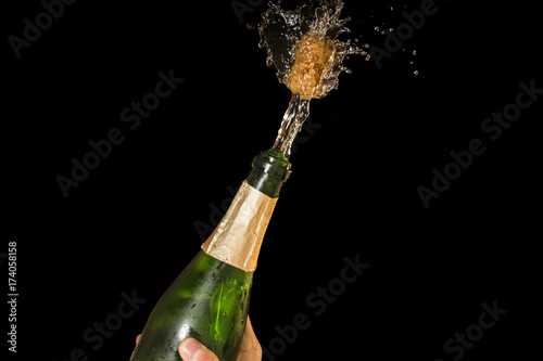 shot of a champagne cork on a black background