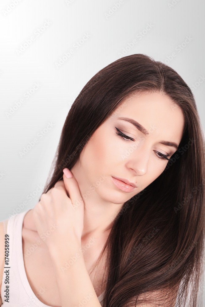 Tired Neck. Beautiful Young Woman Suffering From Neck Pain. Attractive Female Feeling Tired, Exhausted, Stressed. Girl Massaging Painful Neck With Hand. Body And Health Care Concept. High Resolution Tired Neck. Beautiful Young Woman Suffering From Neck Pain. Attractive Female Feeling Tired, Exhausted, Stressed. Girl Massaging Painful Neck With Hand. Body And Health Care Concept. High Resolution
