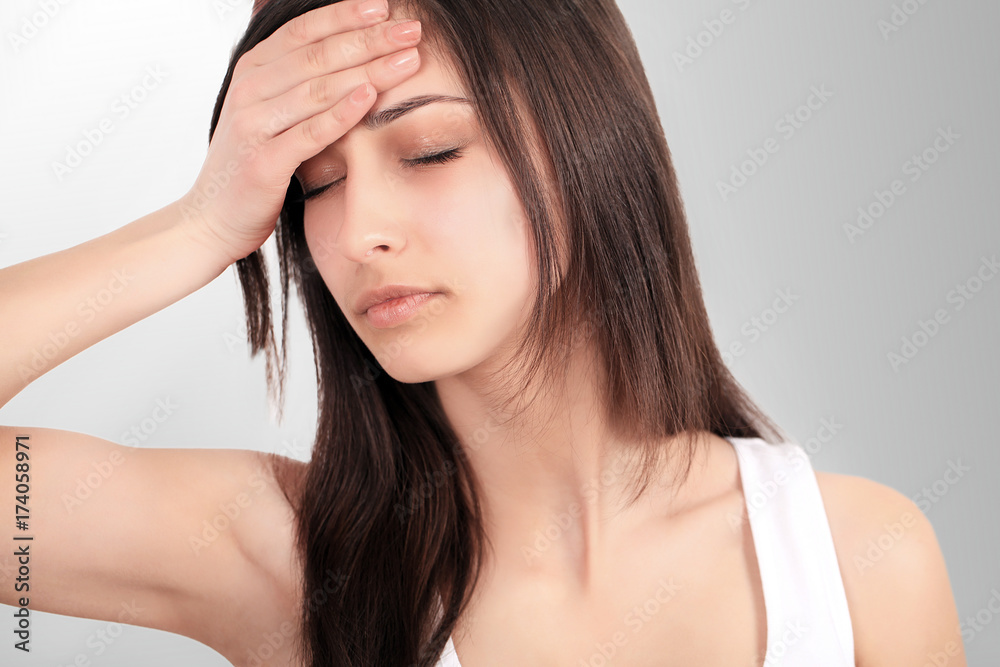 Health And Pain. Stressed Exhausted Young Woman Having Strong Tension Headache. Closeup Portrait Of Beautiful Sick Girl Suffering From Head Migraine, Feeling Pressure And Stress. High Resolution Image Health And Pain. Stressed Exhausted Young Woman Having Strong Tension Headache. Closeup Portrait Of Beautiful Sick Girl Suffering From Head Migraine, Feeling Pressure And Stress. High Resolution Image