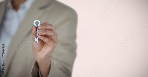 Woman Holding key in front of vignette