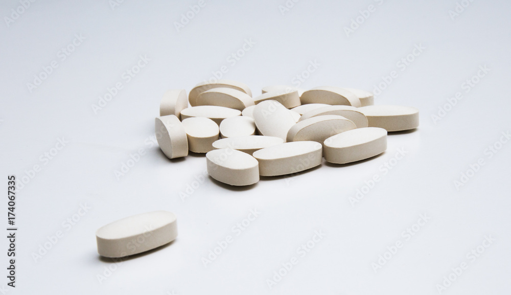 Pills , vitamine on the isolated white background Pills , vitamine on the isolated white background