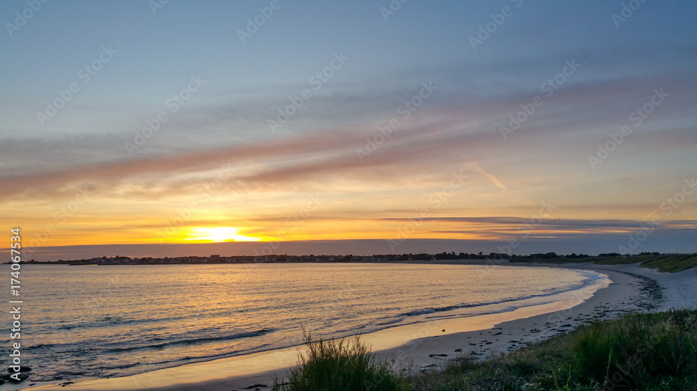 Beautiful sunset over a Brittany beach on the French coastline
