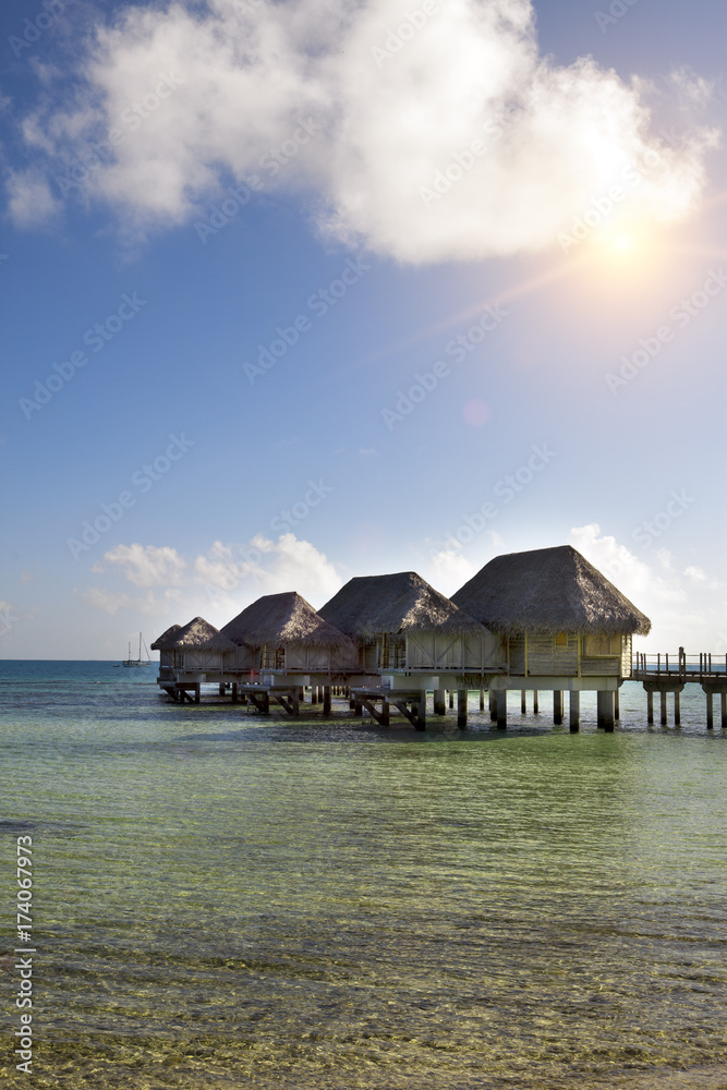houses over the transparent quiet sea water